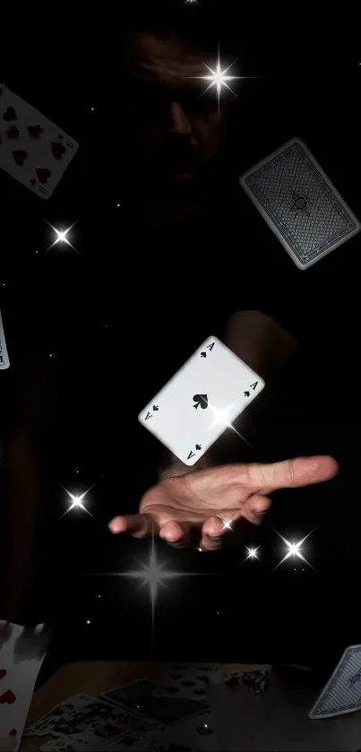 Floating playing cards in a magical, dark background with hand.