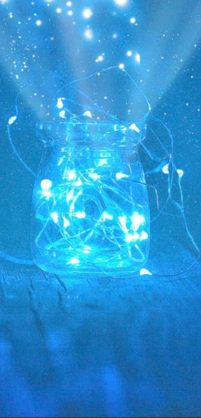 Jar of glowing blue fairy lights with a starry blue background.