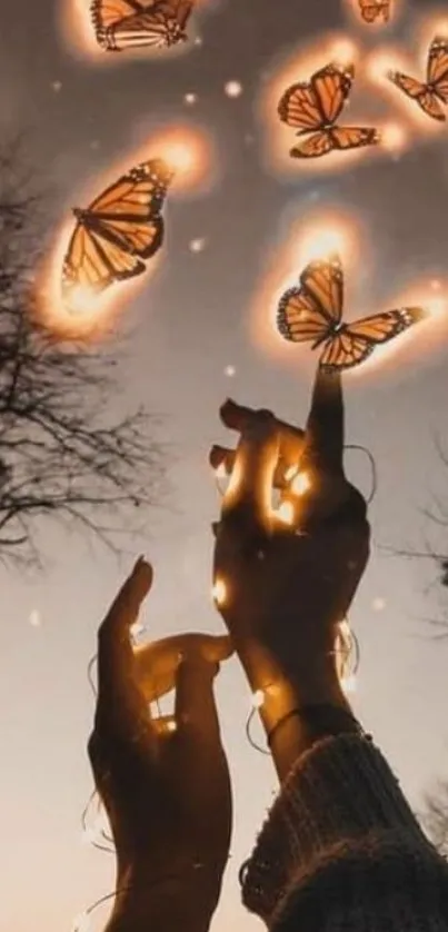 Hands reaching towards glowing butterflies in the night sky.