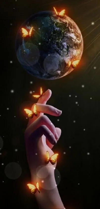 Hand touching Earth surrounded by glowing butterflies.