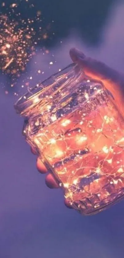 Hand holding a glass jar of twinkling fairy lights on a purple background.