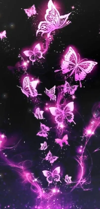 Magical pink butterflies on dark background wallpaper.