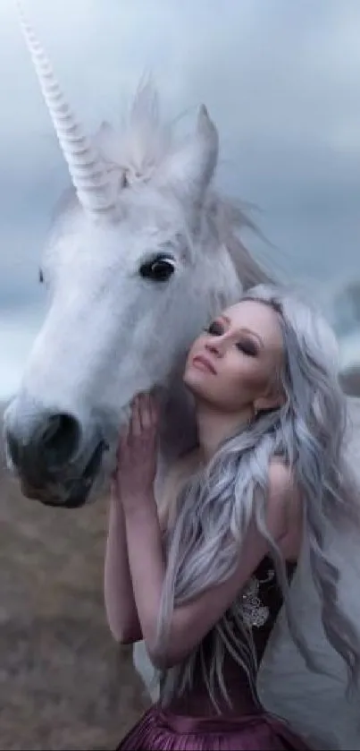 A serene woman with a unicorn in a mystical, gray-toned landscape.