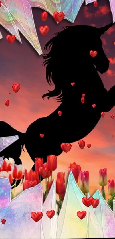 Silhouette of a unicorn with tulips and hearts against a vibrant sunset sky.