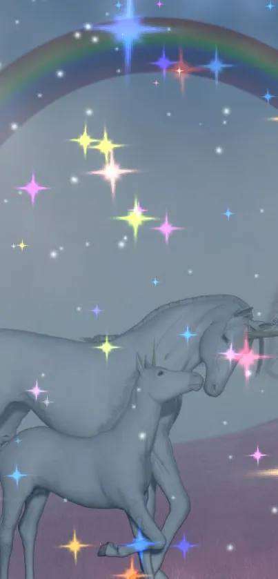 Enchanting unicorns under a starry rainbow in a galaxy-themed wallpaper.