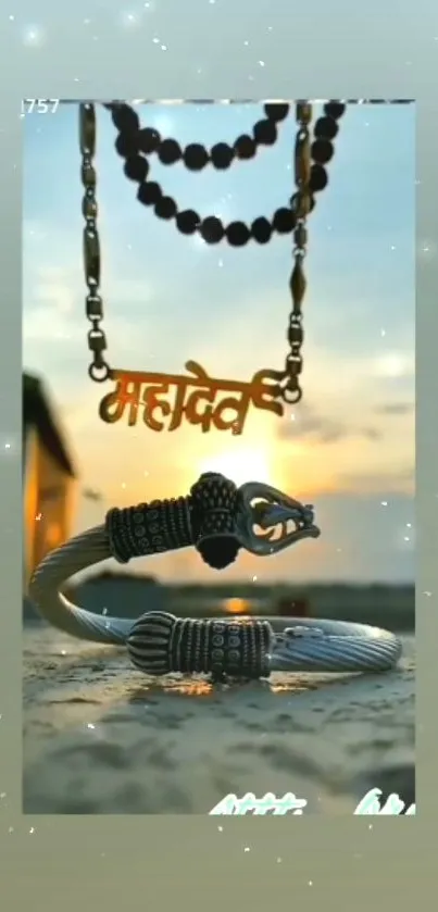 Mahadev pendant with bracelets against a soft sky.