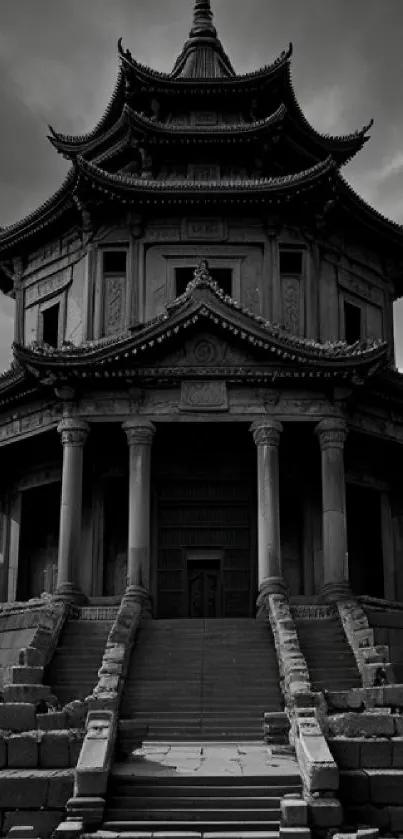 Majestic ancient temple with dramatic clouds and stone steps, in grayscale.