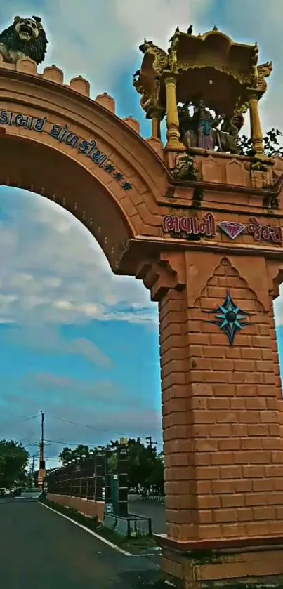 Majestic archway under a clear blue sky with lush greenery around.