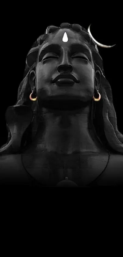 Majestic black Shiva statue with crescent moon on mobile wallpaper.