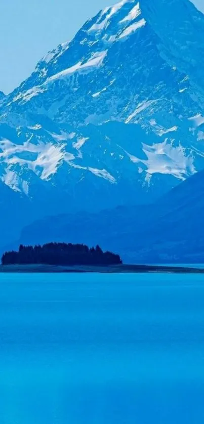 Majestic mountain and lake in blue hues.