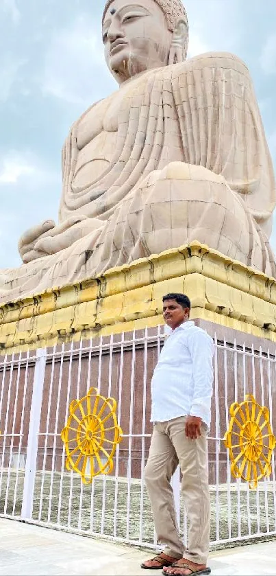 Buddha statue with calm sky backdrop.