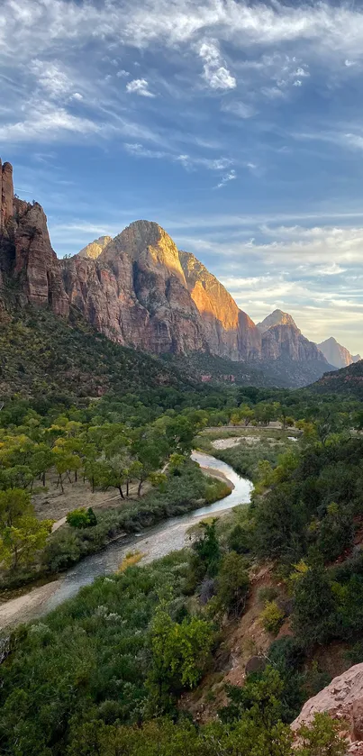 Majestic canyon with mountains and river under a blue sky.