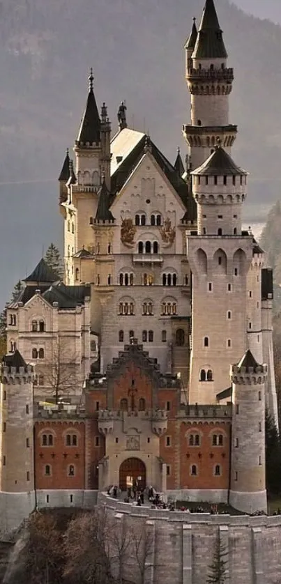 Majestic castle amidst autumn foliage.