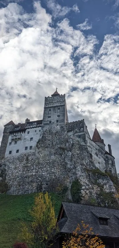 Majestic castle with cloudy sky background.