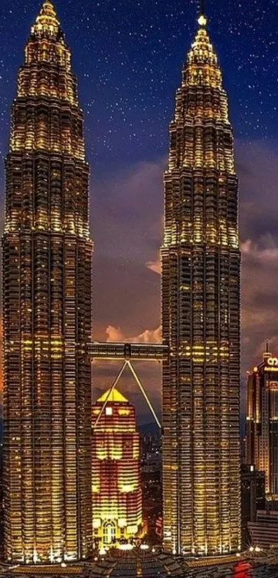 Night cityscape with lit skyscrapers and starry sky.