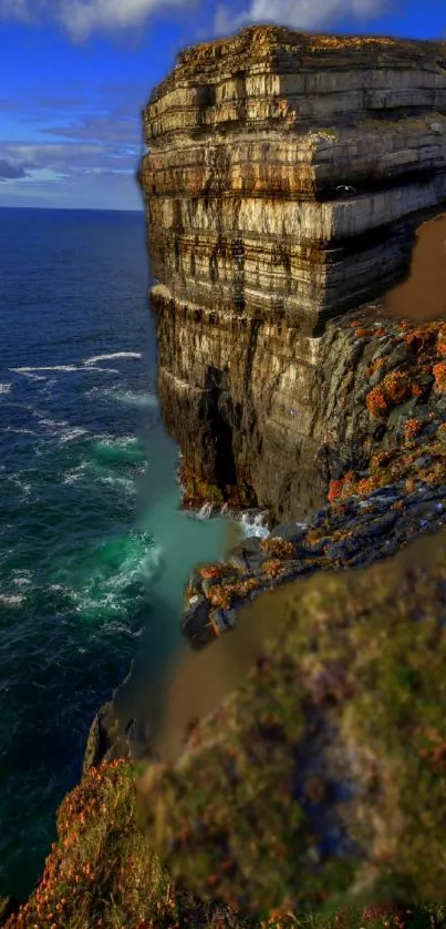 Majestic cliffside with ocean view and lush landscape.