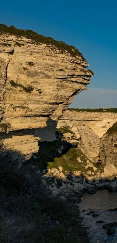 Majestic sunset view of a coastal cliff.