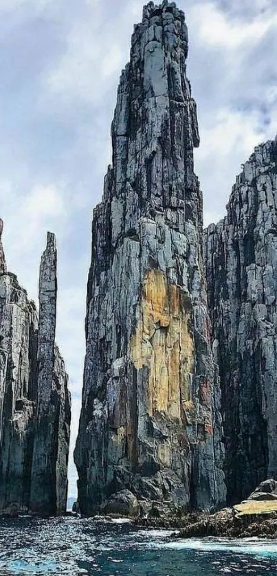 Majestic coastal rock formation with ocean view.