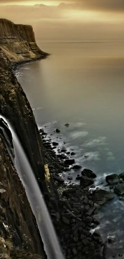 Majestic waterfall cascading over cliffs during sunset.