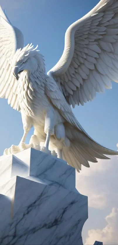 Majestic eagle statue on marble pedestal against blue sky.