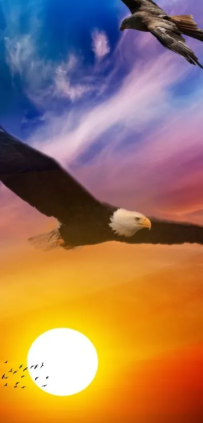 Eagle soaring over a vibrant sunset sky wallpaper.