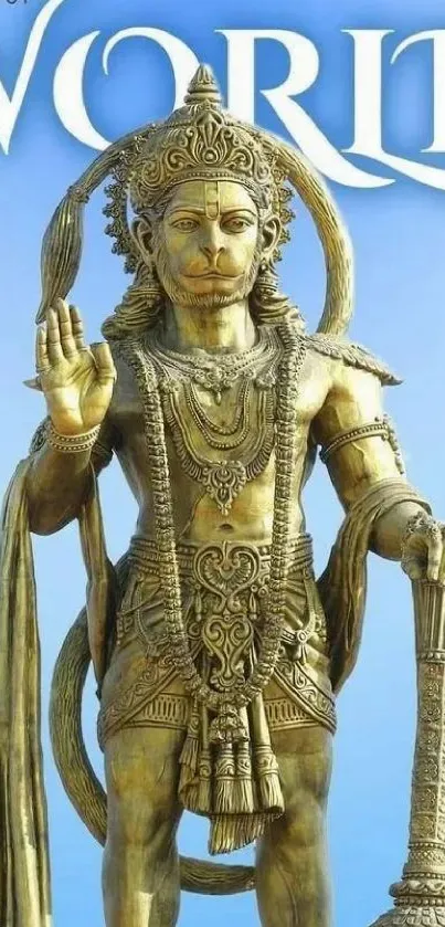 Golden Hanuman statue with blue sky background.