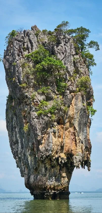 Majestic limestone island against blue sky.