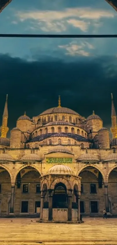 Majestic mosque under dramatic dusk sky, showcasing stunning architecture.