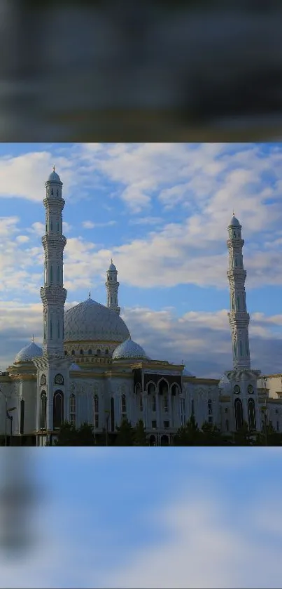 Majestic mosque under a blue sky, perfect for a serene mobile wallpaper.