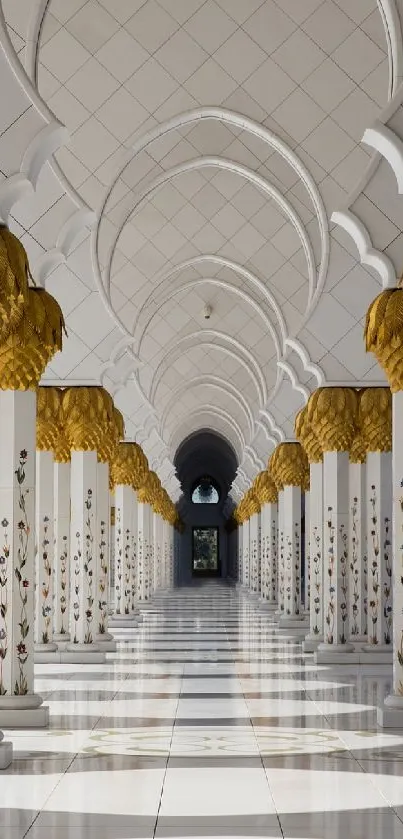 Elegant mosque interior with golden columns and arches.