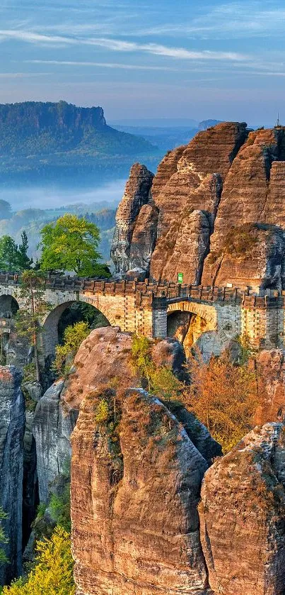 Majestic stone bridge over rocky cliffs with scenic mountain views.