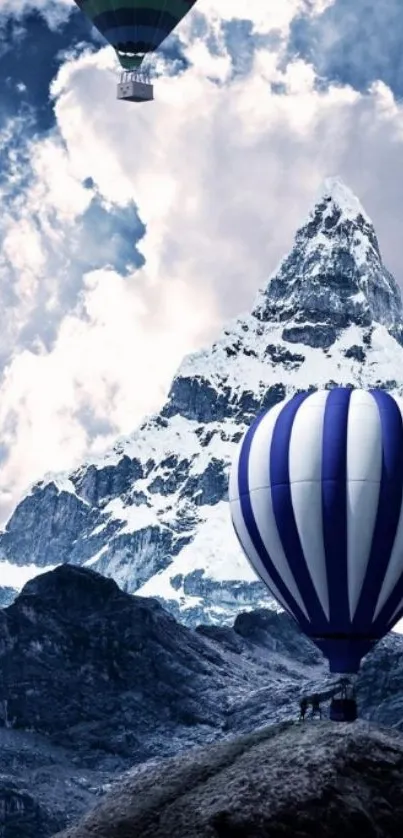 Hot air balloons float over a snow-capped mountain under a blue sky.