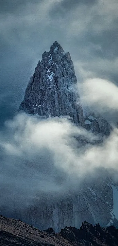 Majestic mountain peak shrouded in mist.