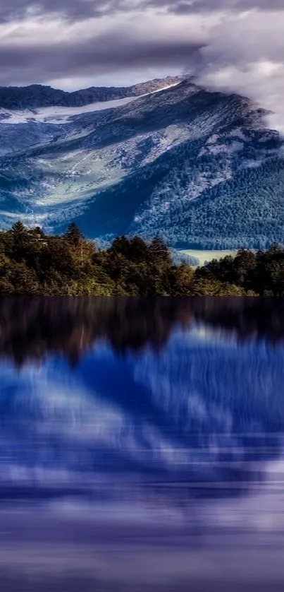 Mountain landscape with lake reflection and clouds.