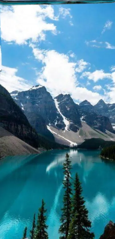 Majestic mountain lake with turquoise waters and cloudy sky.