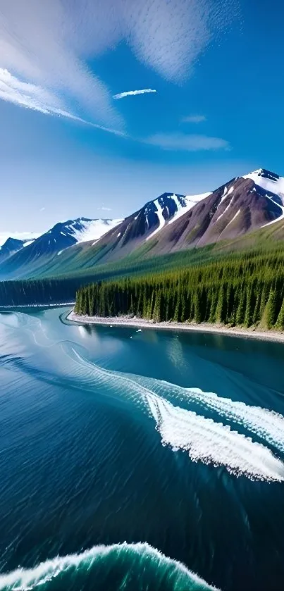 Mountain lake with snowy peaks and a serene blue sky.