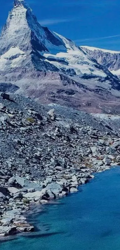 Majestic mountain with a blue lake in the foreground.