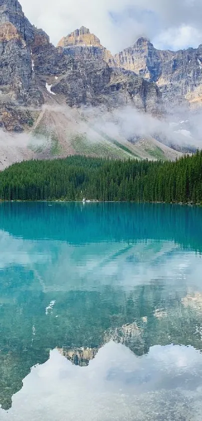 Serene mountain lake with turquoise waters, rocky peaks, and green forest reflection.