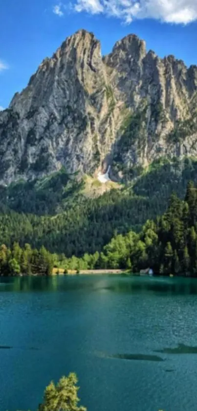 A majestic mountain with a serene lake under a blue sky.