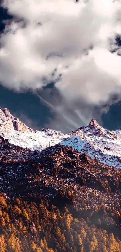 Snowy mountain peaks under a cloudy sky