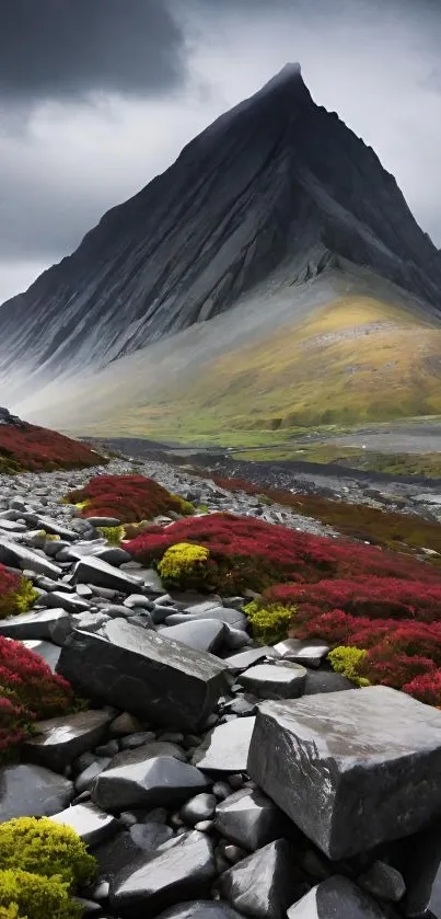 Majestic mountain peak with vibrant flora in foreground.