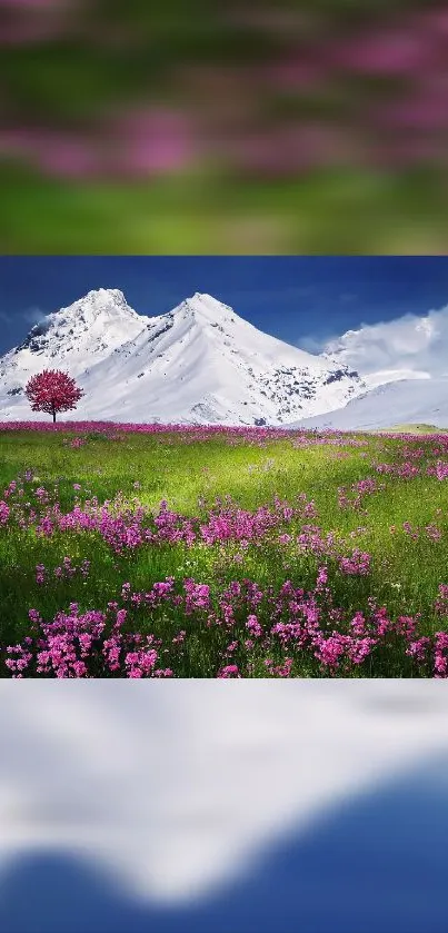 Majestic mountain landscape with pink flowers and blue sky.