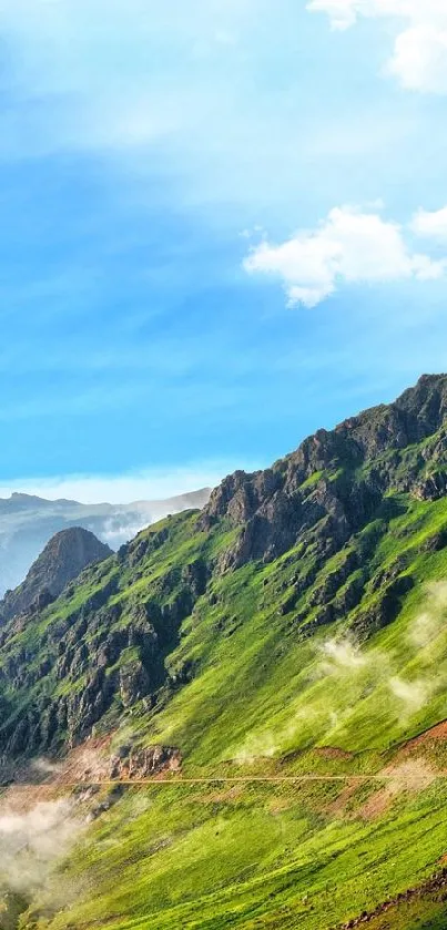 Mountain landscape with green hills and blue sky in a serene mobile wallpaper.