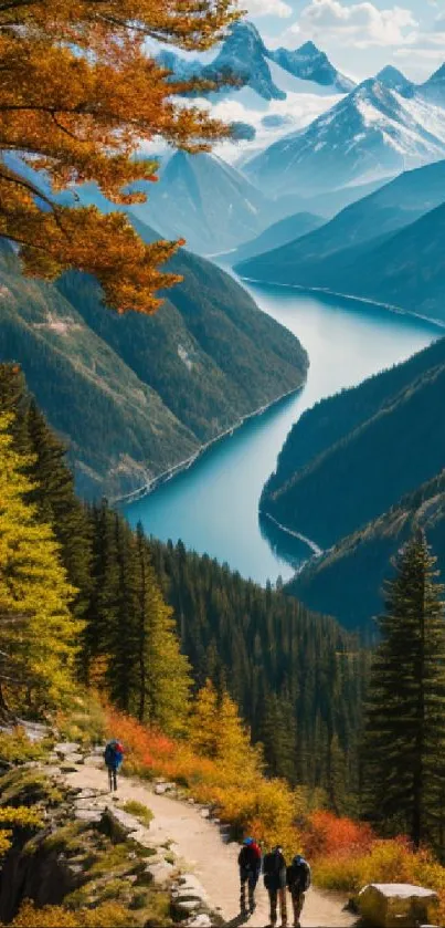 Majestic mountain range with autumn foliage and river.