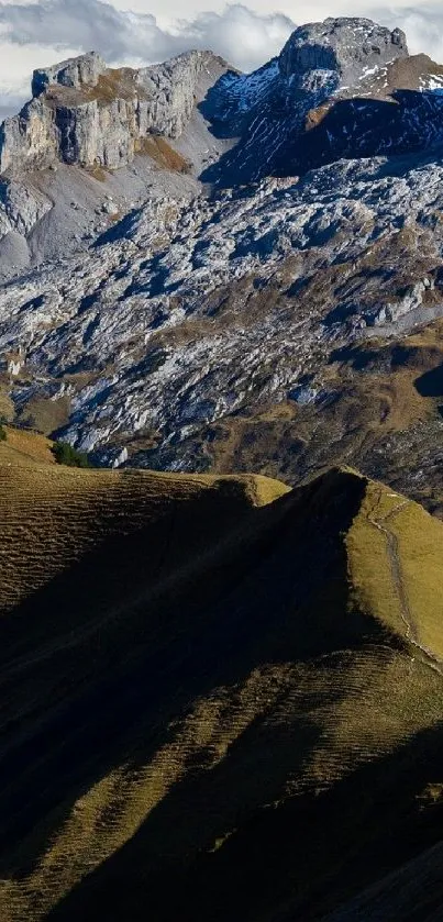 Majestic mountain landscape with rocky peaks and lush valleys.