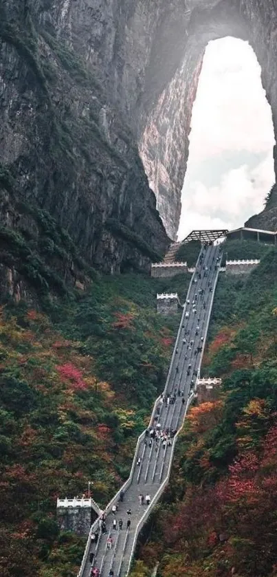 Mountain pathway with vibrant scenery and stunning natural arch.