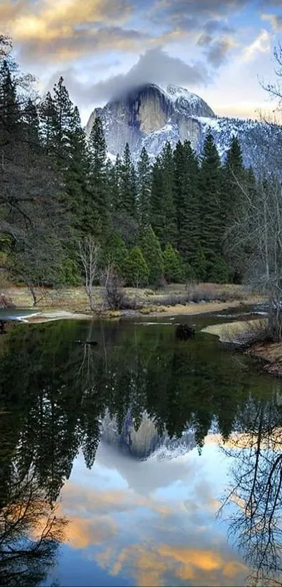 Serene mountain reflection in calm lake with vibrant sky.