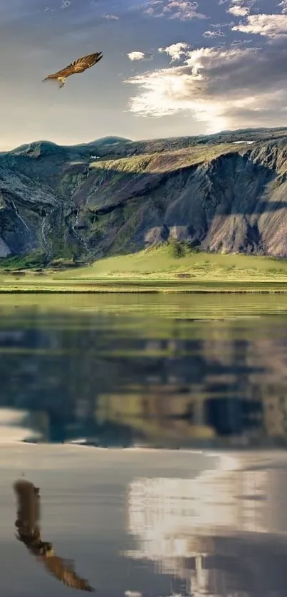 Majestic mountains with a serene lake reflection and soaring bird.