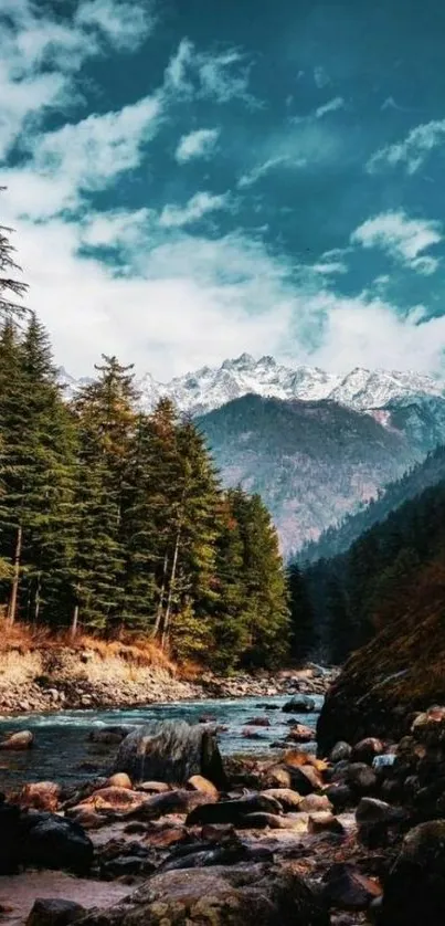 Scenic view of mountains, river, and forest with a vibrant blue sky.