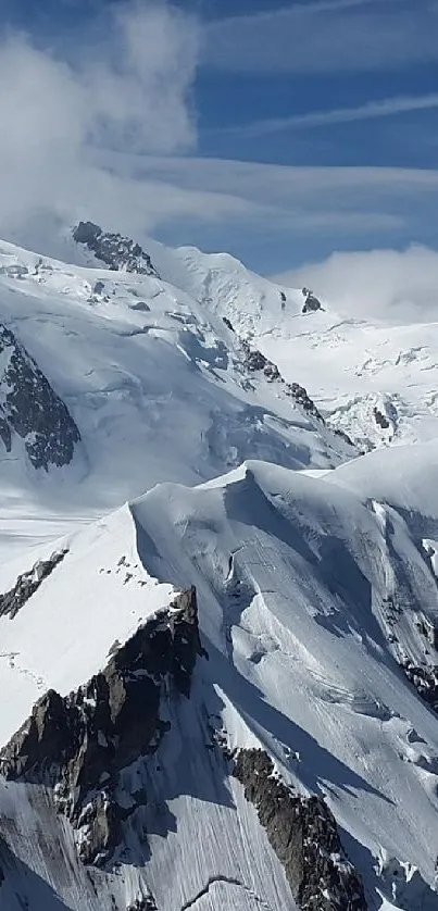 Snowy mountain peaks under a clear blue sky.